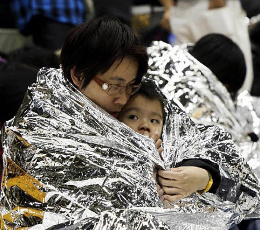Human Body Hypothermia Lifesaving Emergency Blanket In Outdoor Field - Image 6