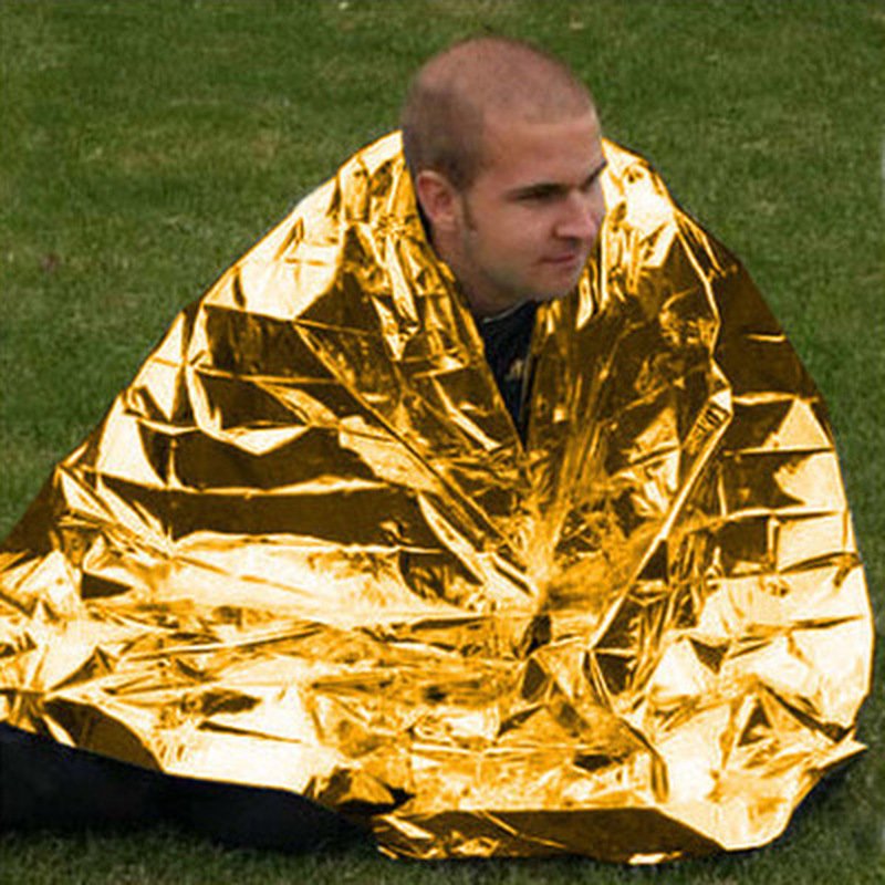 Human Body Hypothermia Lifesaving Emergency Blanket In Outdoor Field - Image 5